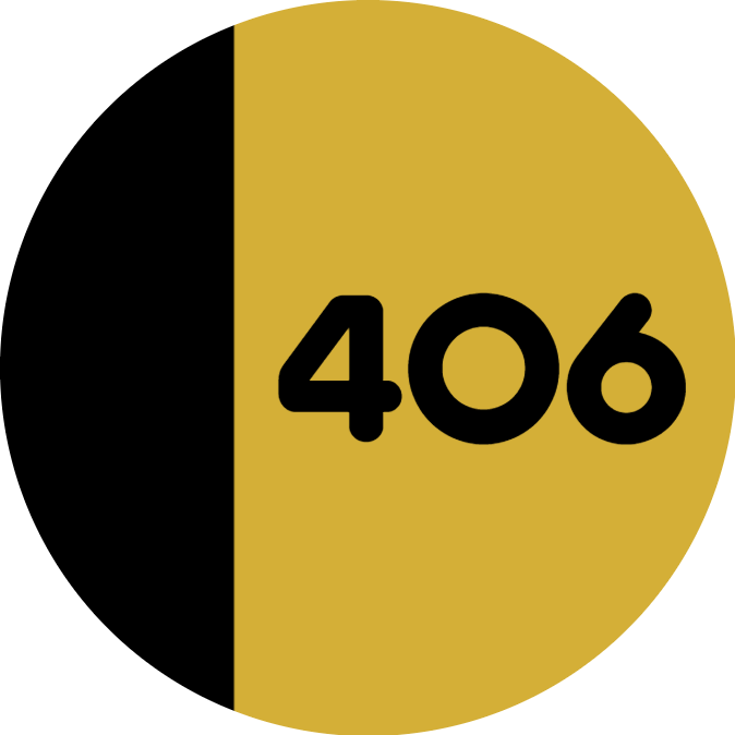 Black and gold rounded door number