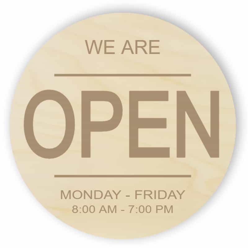 Round wooden opening hours sign