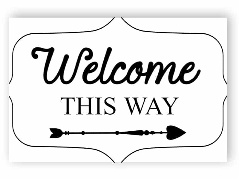 White welcome this way sign