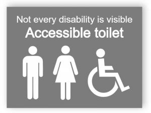 Grey accessible toilets sign