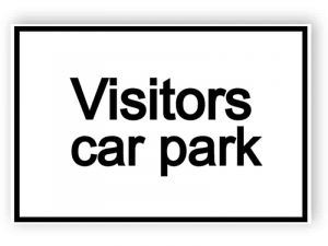 Visitors car park - white sign