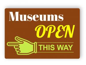Museums open this way sign