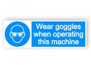 Wear goggles when operating this machine sign