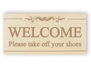 Welcome - please take off your shoes sign